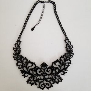 Black lace-like statement necklace